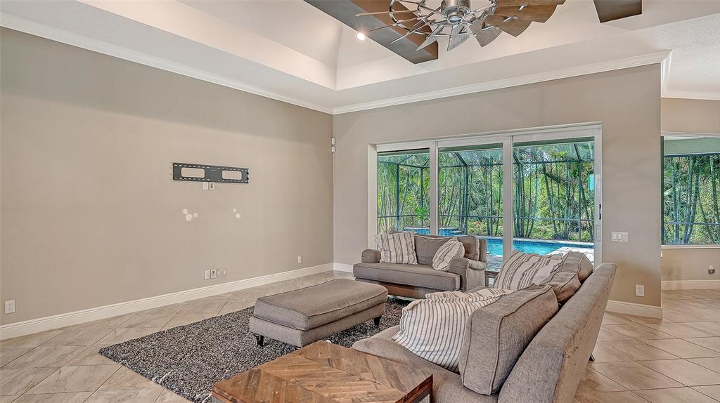 318 Ragdoll Run Bradenton, FL 34212 - Photo 13 of 87 a living room with furniture and a window