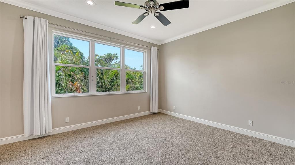 318 Ragdoll Run Bradenton, FL 34212 - Photo 43 of 87 a view of a livingroom with a ceiling fan and window