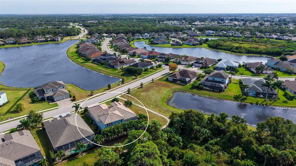 318 Ragdoll Run Bradenton, FL 34212 - Photo 62 of 87 an aerial view of a house with a ocean view