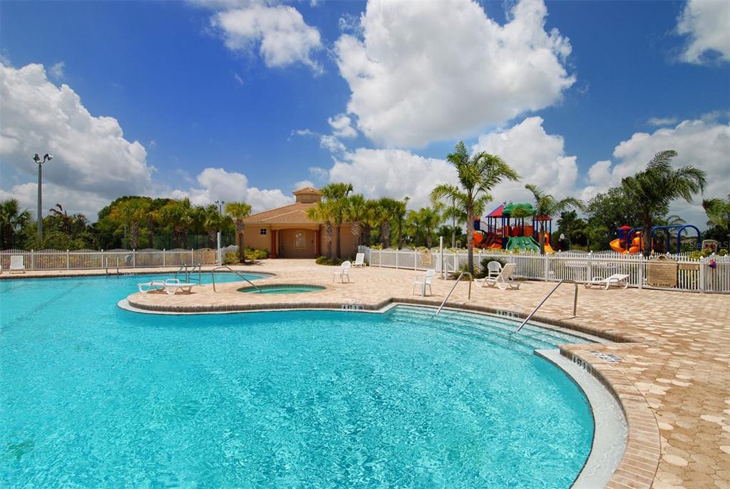 318 Ragdoll Run Bradenton, FL 34212 - Photo 66 of 87 a view of a swimming pool with an outdoor seating