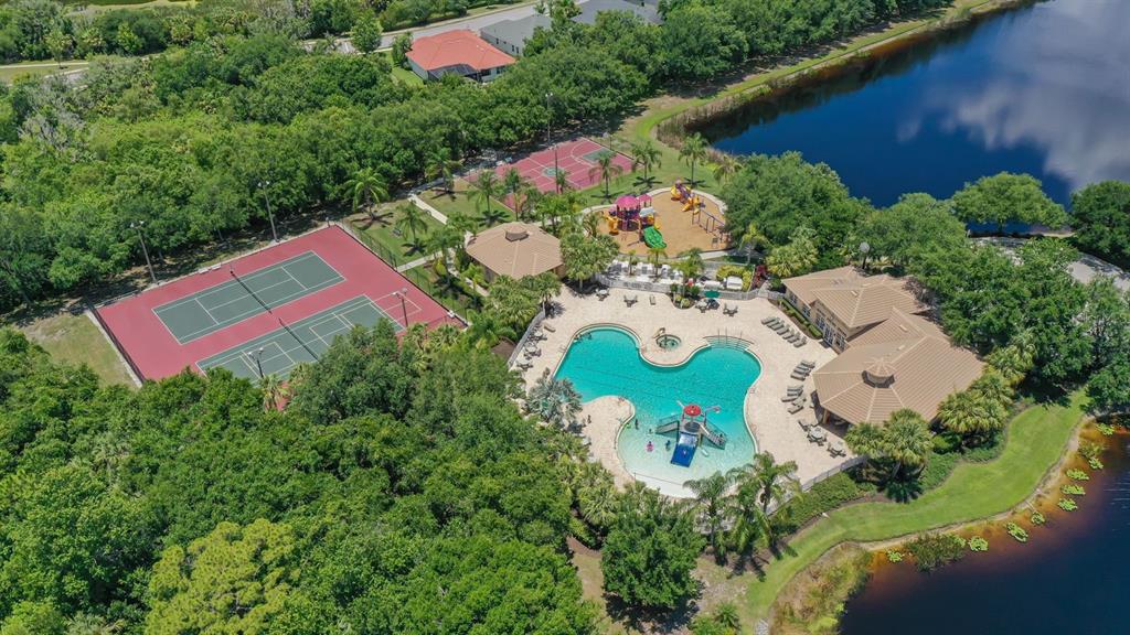 318 Ragdoll Run Bradenton, FL 34212 - Photo 69 of 87 an aerial view of a house with a yard and garden