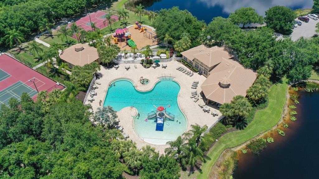 318 Ragdoll Run Bradenton, FL 34212 - Photo 70 of 87 an aerial view of a house with a swimming pool and garden