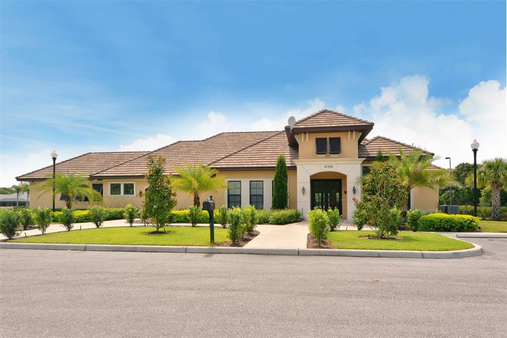 318 Ragdoll Run Bradenton, FL 34212 - Photo 85 of 87 a front view of a house with a yard