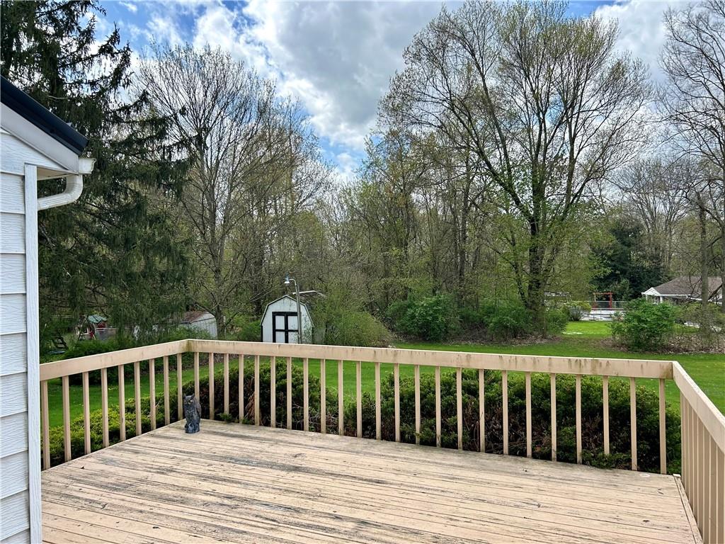23 Paxton Road Sandy Lake, PA 16145 - Photo 8 of 25 a view of wooden deck and trees