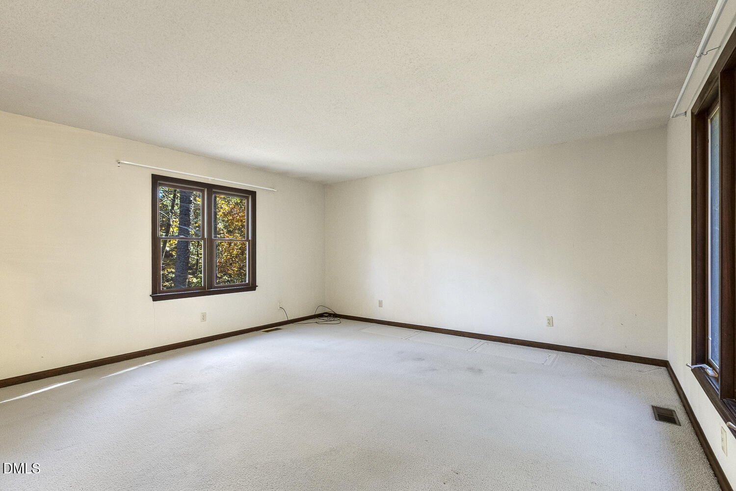 3028 Ethan Lane Raleigh, NC 27613 - Photo 11 of 58 a view of an empty room with a window