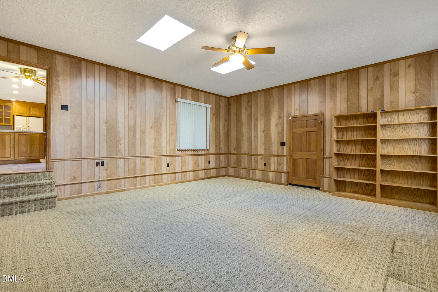 3028 Ethan Lane Raleigh, NC 27613 - Photo 28 of 58 a view of an empty room with a window