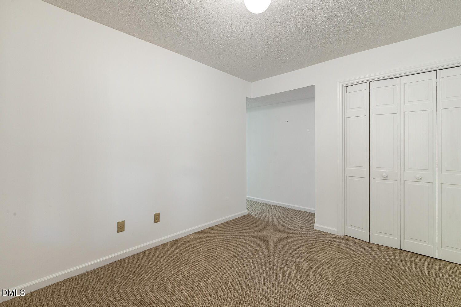 3028 Ethan Lane Raleigh, NC 27613 - Photo 37 of 58 a view of an empty room