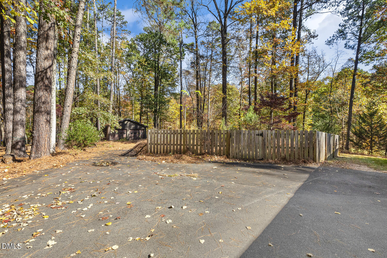3028 Ethan Lane Raleigh, NC 27613 - Photo 41 of 58 a view of backyard with wooden fence