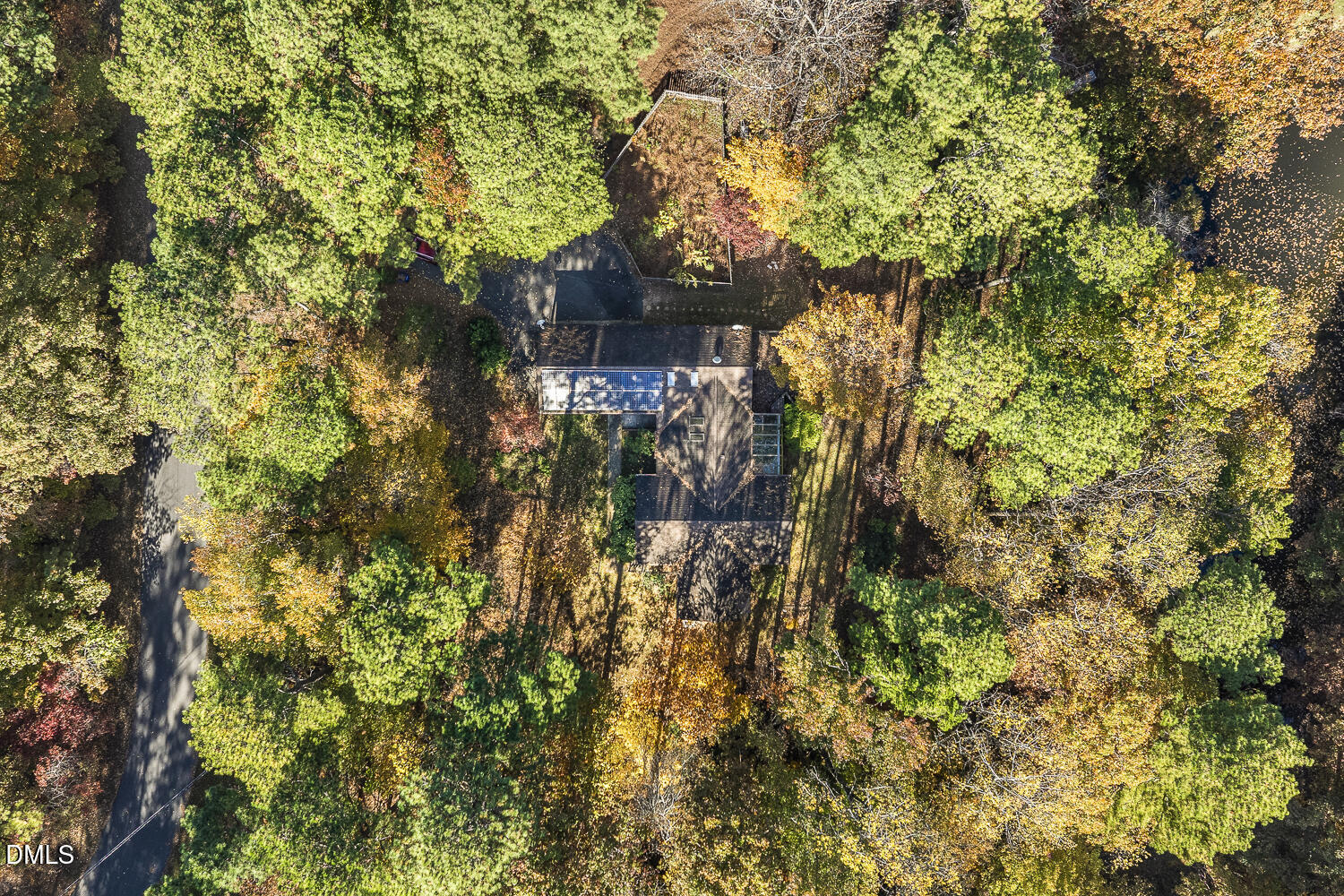 3028 Ethan Lane Raleigh, NC 27613 - Photo 53 of 58 a view of a house with a tree