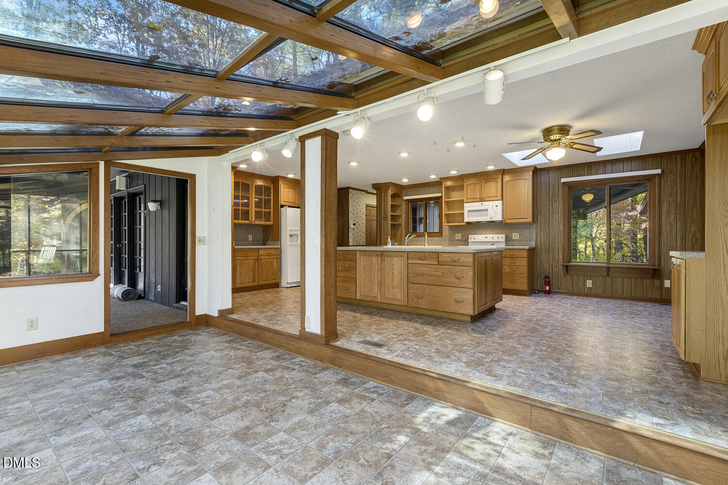 3028 Ethan Lane Raleigh, NC 27613 - Photo 6 of 58 a view of a hall with kitchen