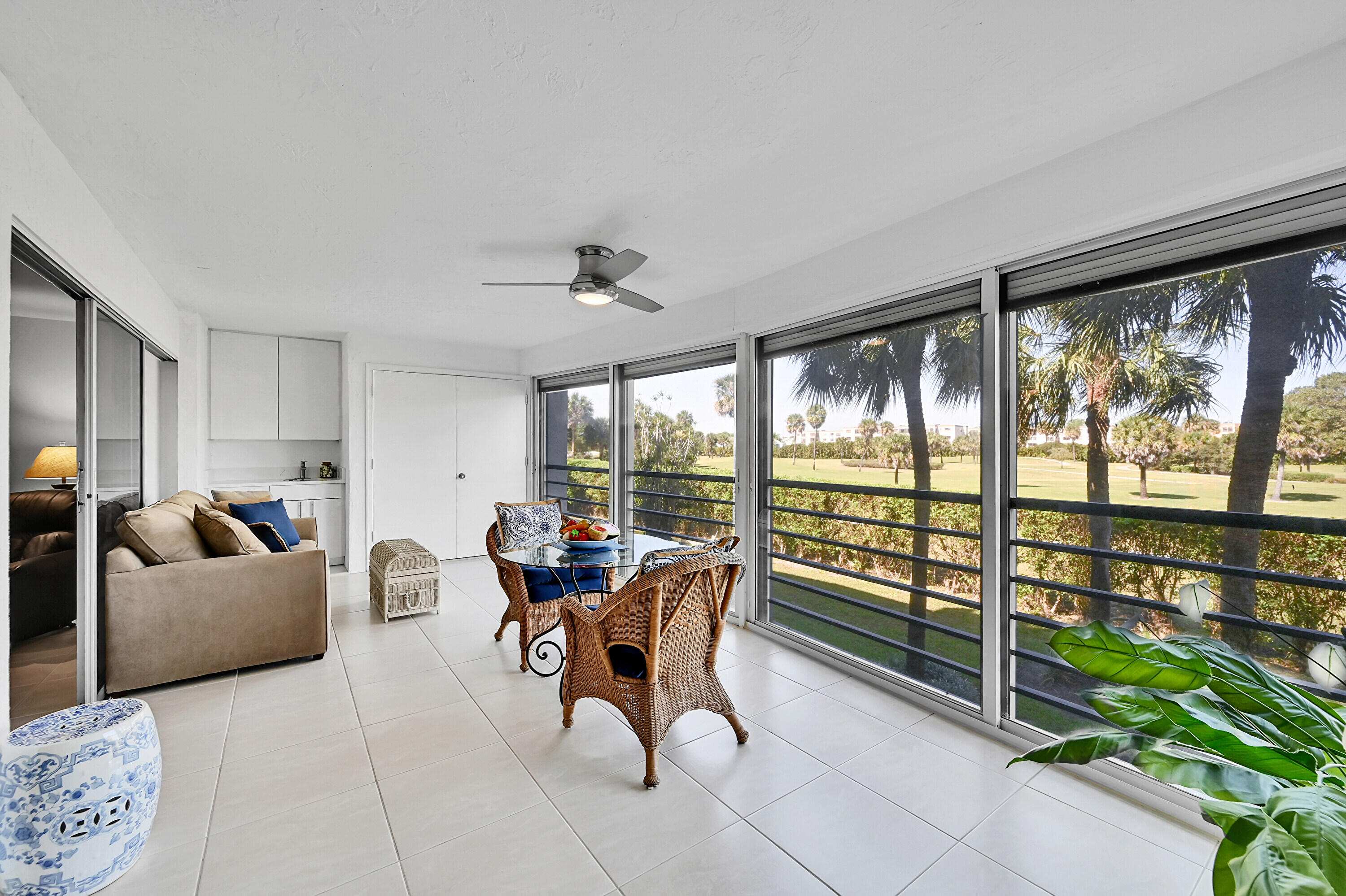 9165 Southwest 14th Street, Unit 1205 Boca Raton, FL 33428 - Photo 16 of 28 Glass / Screen Patio