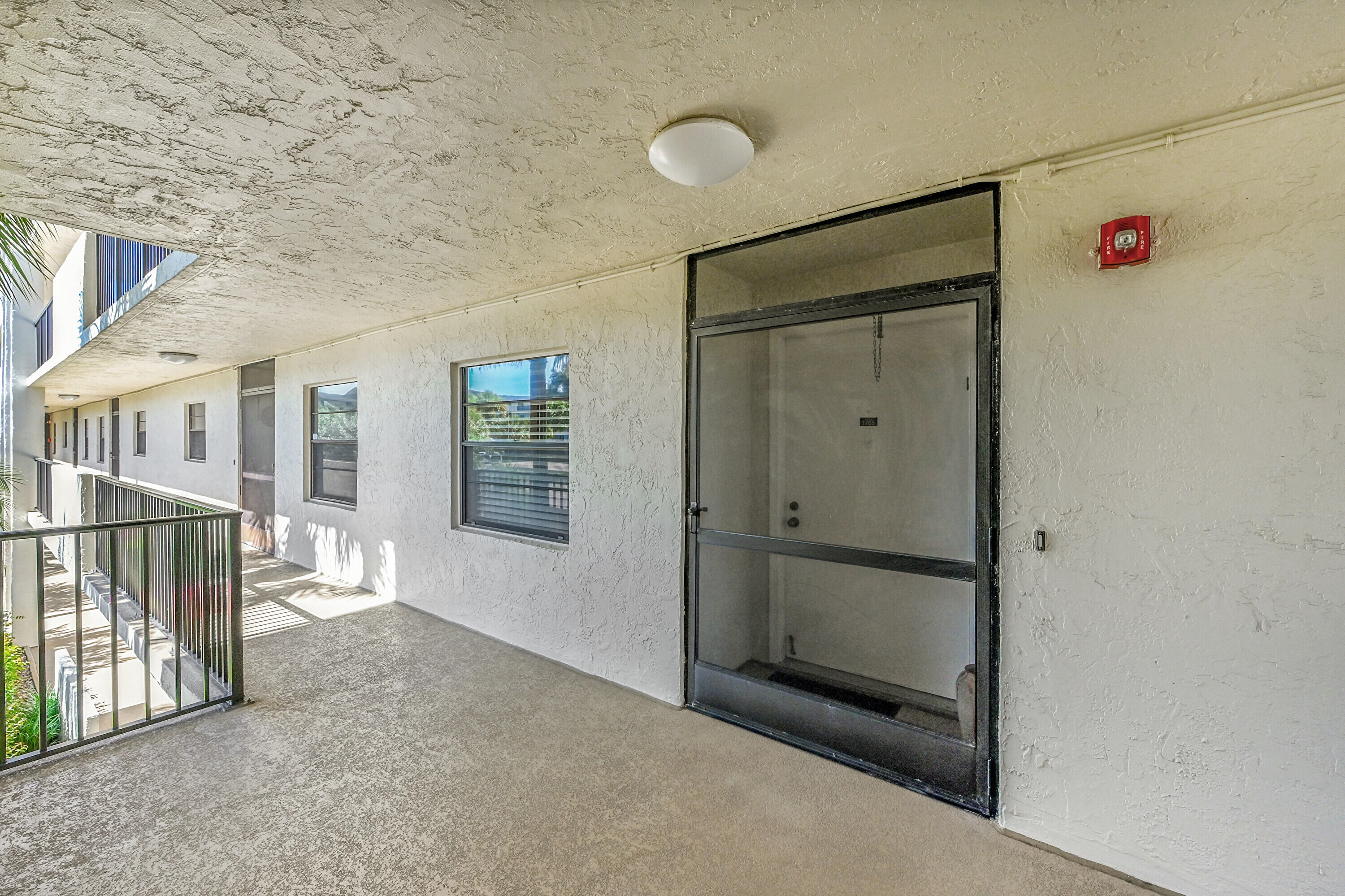 9165 Southwest 14th Street, Unit 1205 Boca Raton, FL 33428 - Photo 3 of 28 Front Door