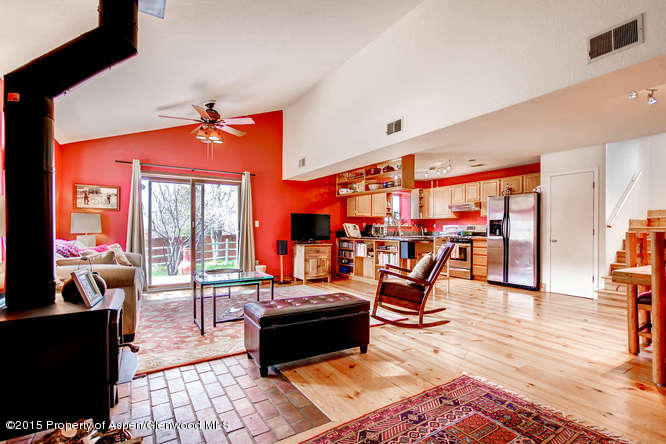 40 Riversedge Court, Unit A Basalt, CO 81621 - Photo 2 of 12 a living room view with a table and chairs