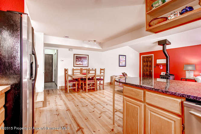 40 Riversedge Court, Unit A Basalt, CO 81621 - Photo 5 of 12 a view of a living room and dining room