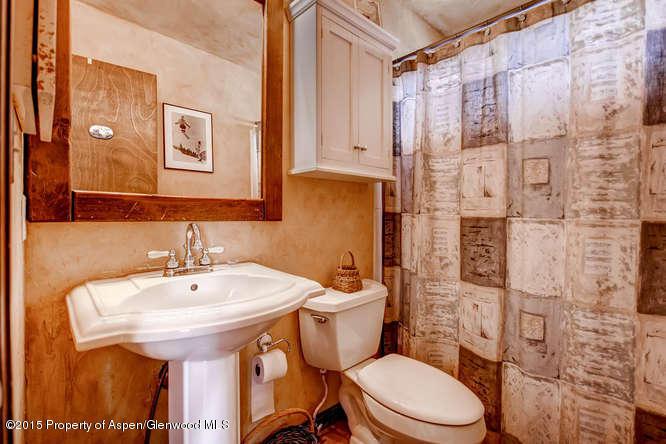 40 Riversedge Court, Unit A Basalt, CO 81621 - Photo 8 of 12 a bathroom with a sink toilet and shower