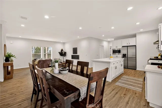 a view of a dining room with furniture