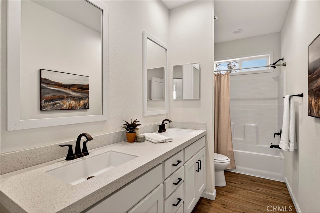 6160 Beacon Court Paradise, CA 95969 - Photo 24 of 34 a bathroom with a tub sink double vanity and tub