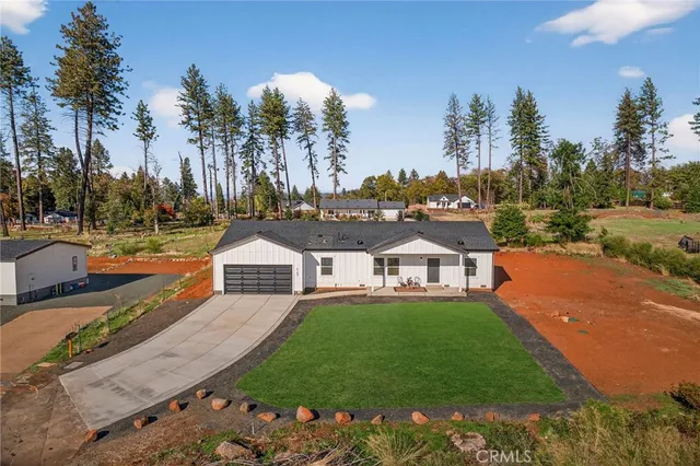 a view of a city street and trees