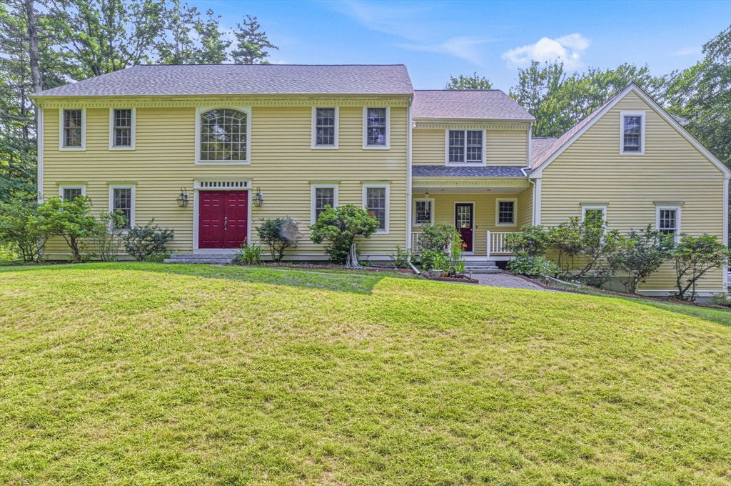 85 Cedarwood Road Boxborough, MA 01719 - Photo 1 of 41 a front view of house with yard and green space