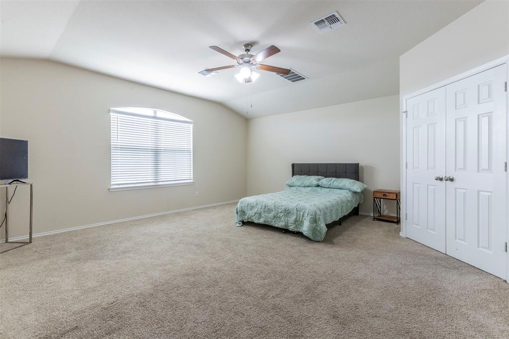 2904 Beutel Road Lorena, TX 76655 - Photo 13 of 40 a bedroom with a bed and window