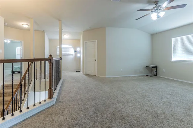 a view of a hallway with a chandelier