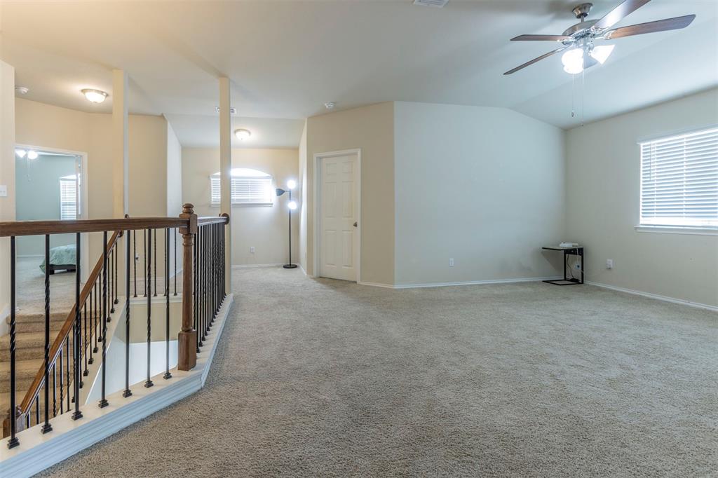 2904 Beutel Road Lorena, TX 76655 - Photo 24 of 40 a view of a hallway with a chandelier
