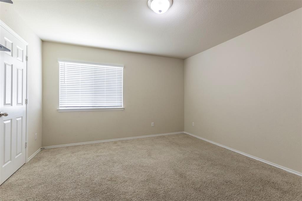 2904 Beutel Road Lorena, TX 76655 - Photo 29 of 40 an empty room with a window