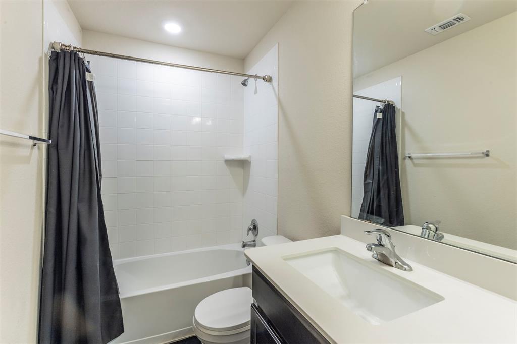 2904 Beutel Road Lorena, TX 76655 - Photo 30 of 40 a bathroom with a sink toilet and shower