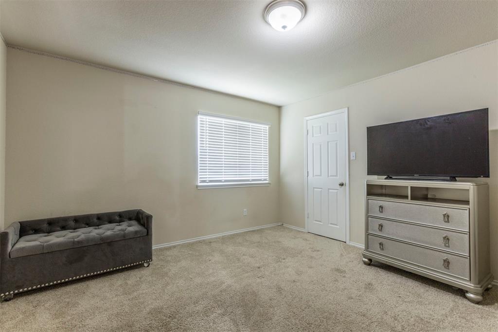 2904 Beutel Road Lorena, TX 76655 - Photo 31 of 40 a room with furniture and flat screen tv