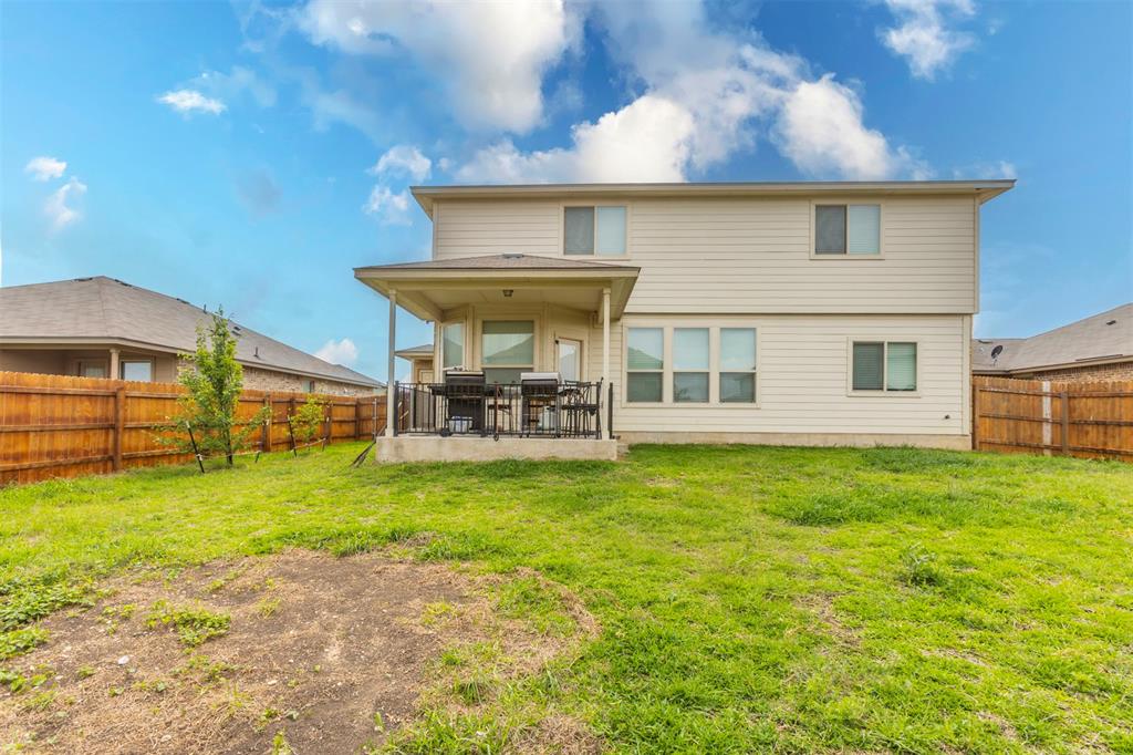 2904 Beutel Road Lorena, TX 76655 - Photo 35 of 40 a view of a house with a backyard