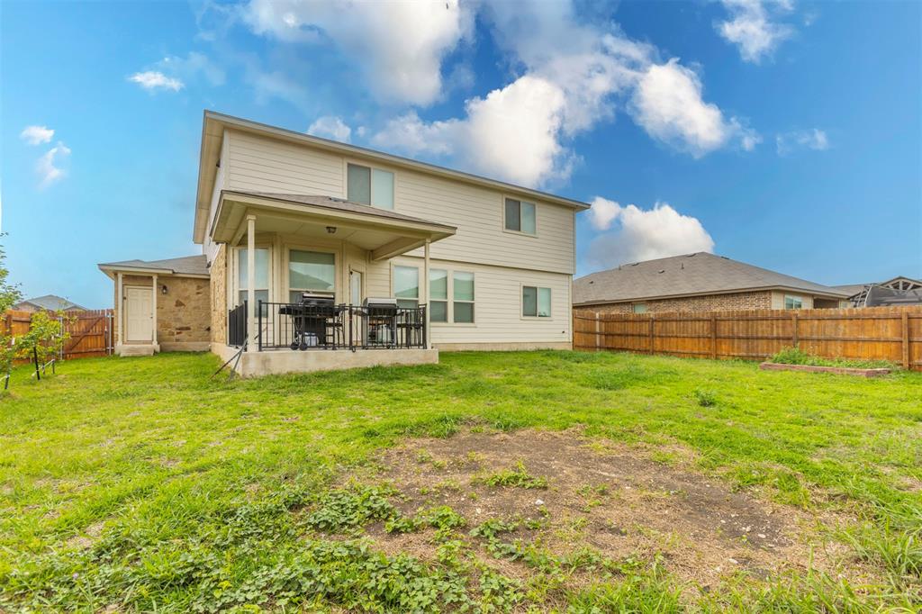 2904 Beutel Road Lorena, TX 76655 - Photo 36 of 40 a backyard of a house with table and chairs