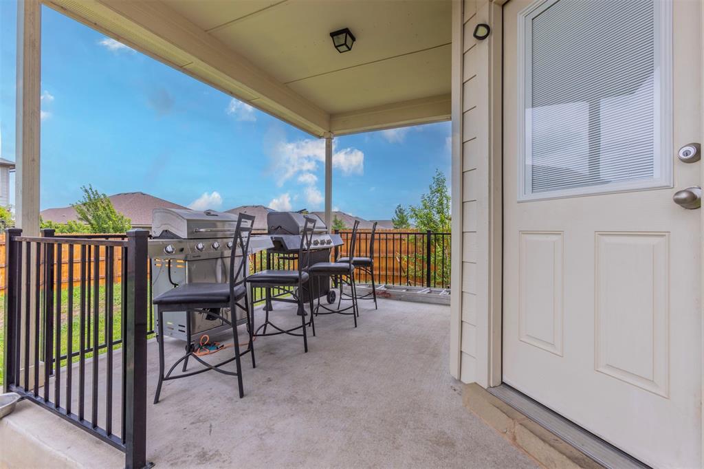 2904 Beutel Road Lorena, TX 76655 - Photo 38 of 40 a view of a porch with a table and chairs