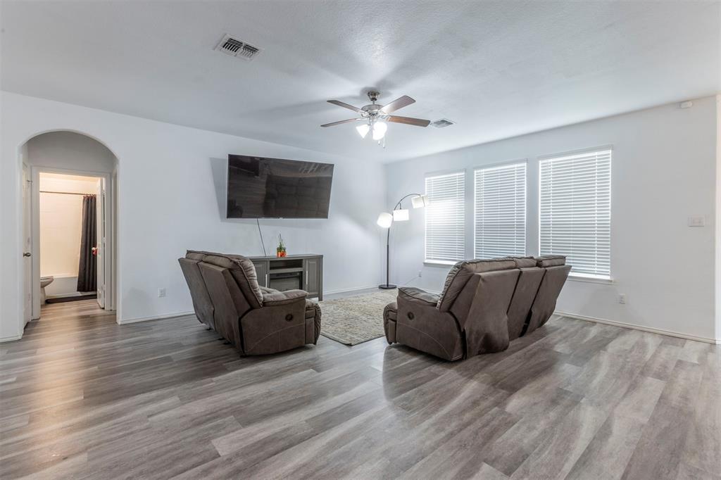 2904 Beutel Road Lorena, TX 76655 - Photo 5 of 40 a living room with furniture and a flat screen tv