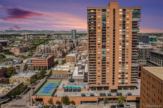 a view of a city with tall buildings
