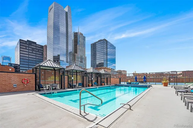 a view of a city with tall buildings