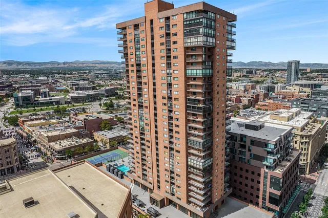 a view of a city with tall buildings