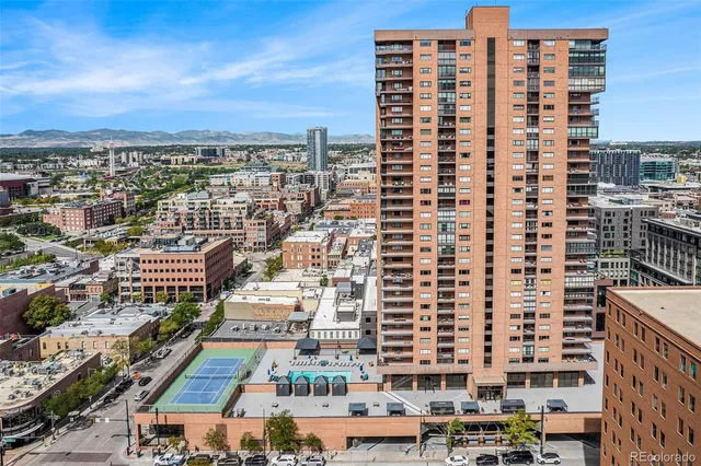 a view of a city with tall buildings