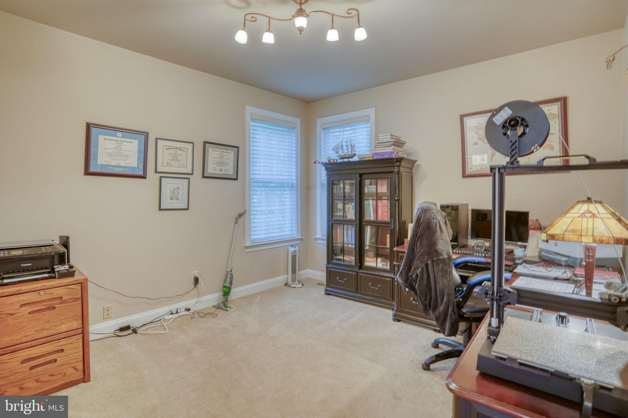 357 Willits Way Garnet Valley, PA 19060 - Photo 11 of 63 a view of a workspace with furniture and a window