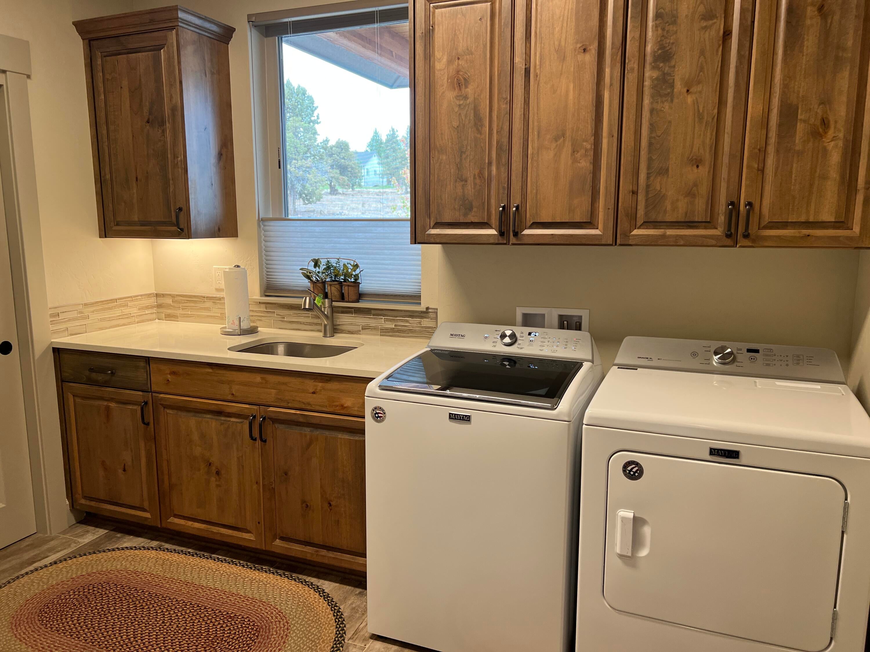 3405 Southwest 45th Street Redmond, OR 97756 - Photo 70 of 76 Big enough for all your laundry chores and a full closet is on the wall to the left