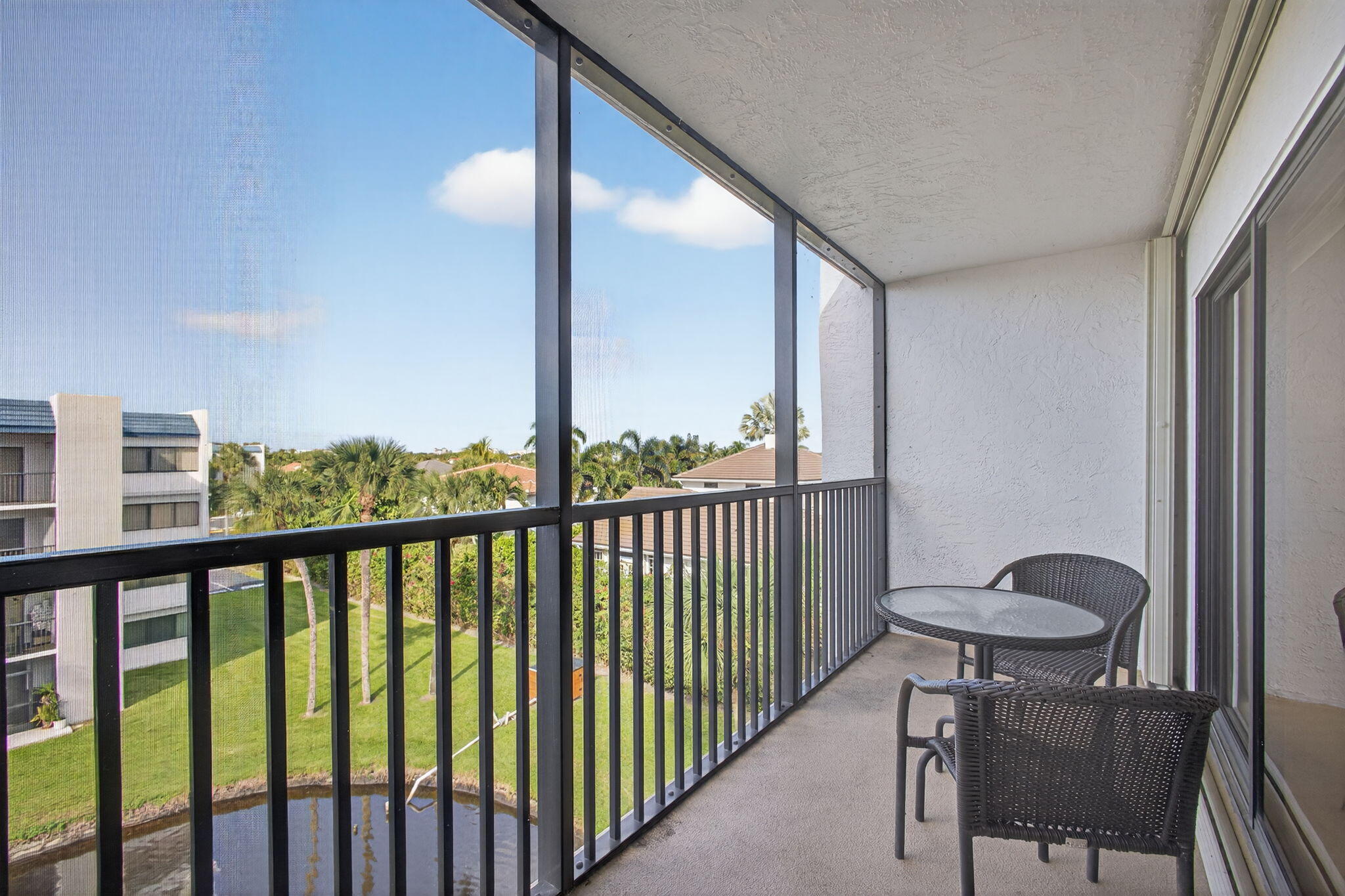 1605 Highway 1, Unit A407 Jupiter, FL 33477 - Photo 29 of 44 Screened Balcony