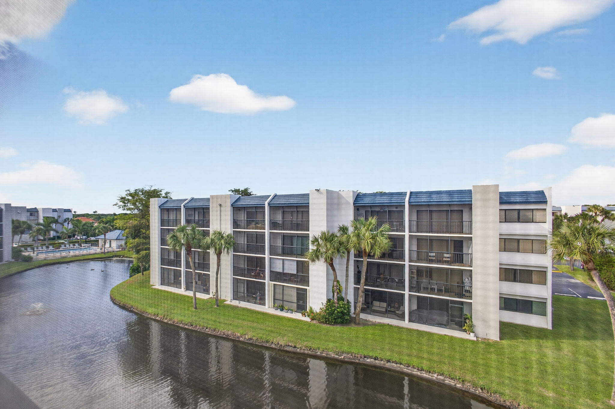 1605 Highway 1, Unit A407 Jupiter, FL 33477 - Photo 31 of 44 View from Screened Balcony