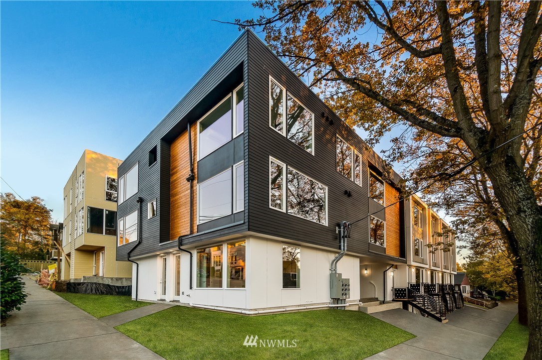 a view of a building with a yard