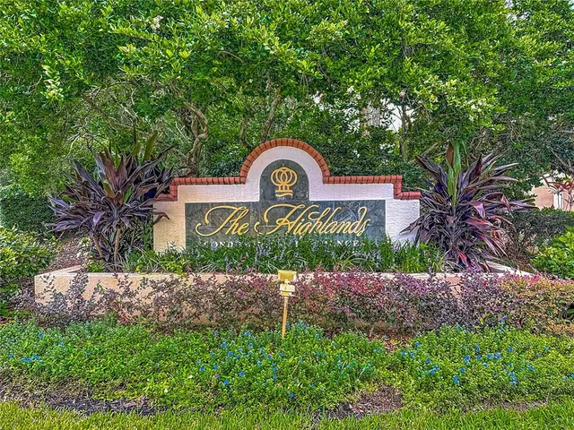 a view of a house with a door and wooden walls