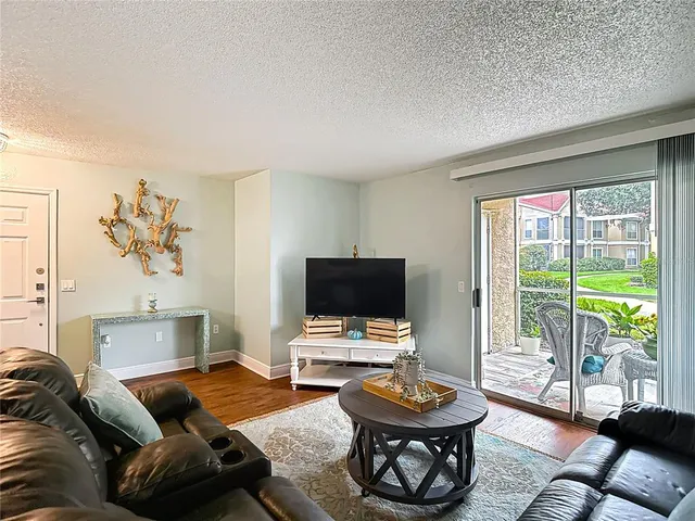 a outdoor living space with furniture and garden view
