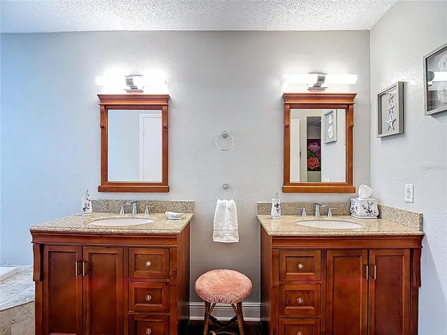 a view of storage and utility room with washer and dryer