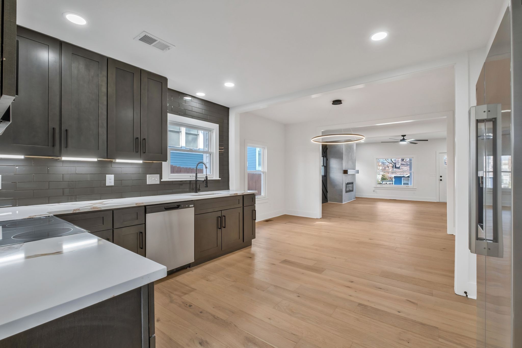 404 Rudolph Avenue Nashville, TN 37206 - Photo 11 of 34 a kitchen with granite countertop a sink and cabinets
