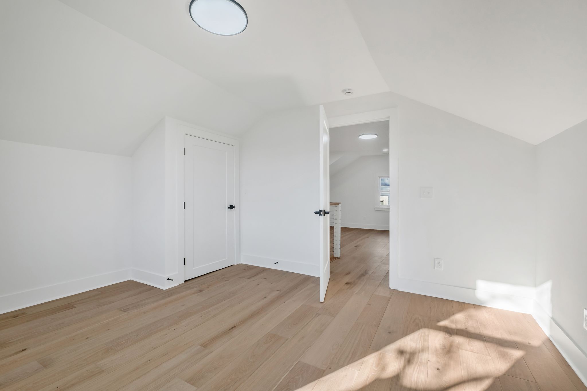 404 Rudolph Avenue Nashville, TN 37206 - Photo 29 of 34 an empty room with wooden floor