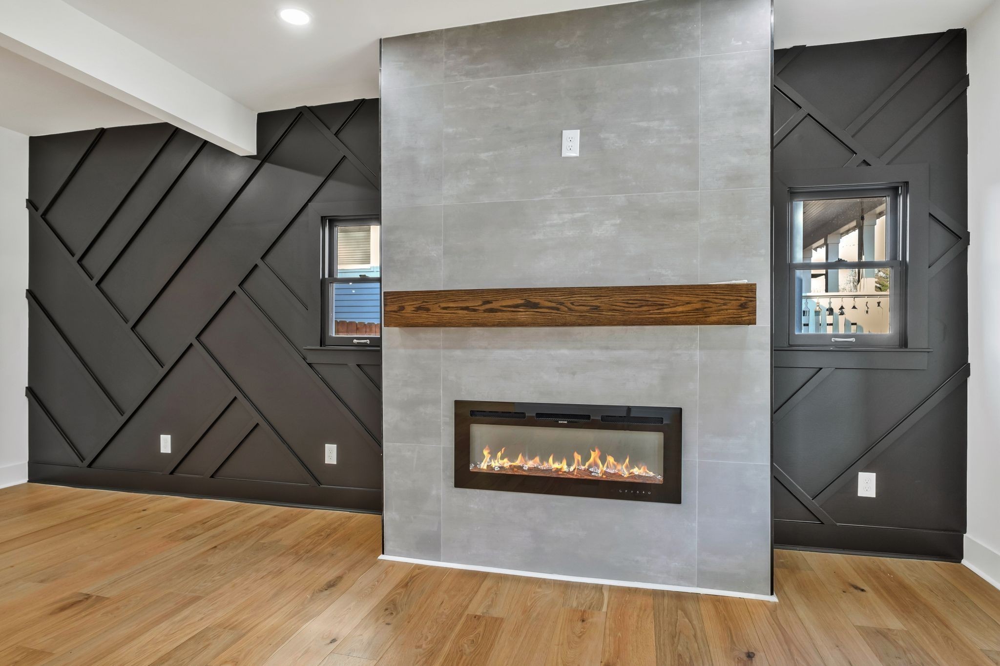 404 Rudolph Avenue Nashville, TN 37206 - Photo 3 of 34 a living room with a fireplace furniture and a wooden floor
