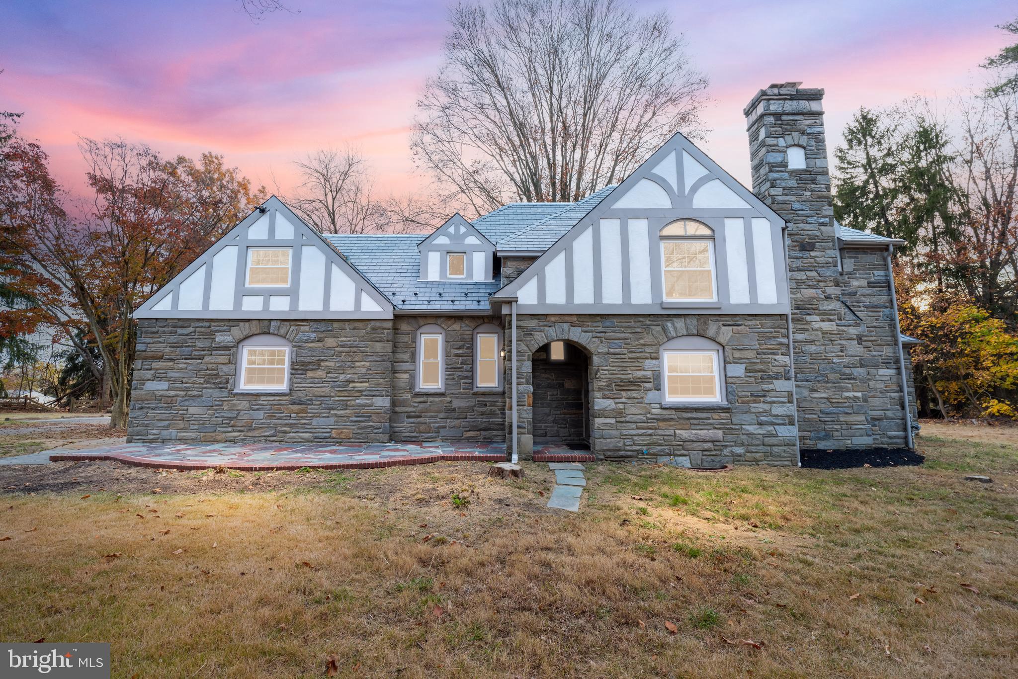 1298 Highway 40 Pilesgrove, NJ 08098 - Photo 1 of 44 a front view of a house with a yard