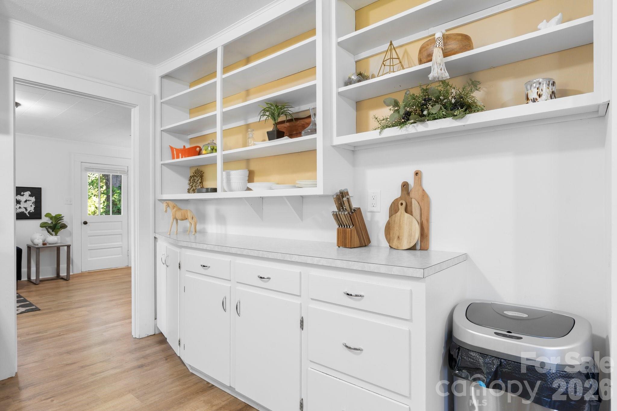 116 Barnes Lane Stony Point, NC 28678 - Photo 14 of 24 a kitchen with a cabinets and wooden floor
